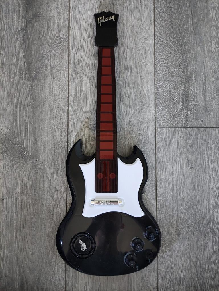 Gibson speelgoed gitaar, Ophalen, Gebruikt