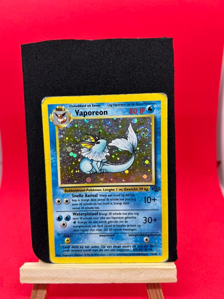 Pokémon Vaporeon 12/64 Jungle Nederlands Holo, Ophalen of Verzenden, Zo goed als nieuw