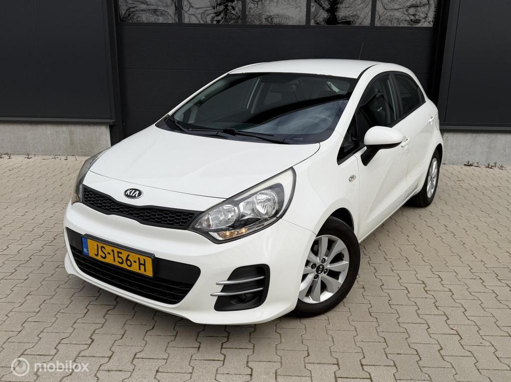 Kia Rio 1.2 CVVT ComfortPlusLine Navigator Cruise NW APK, Auto's, Euro 6, 4 cilinders, Wit, Origineel Nederlands