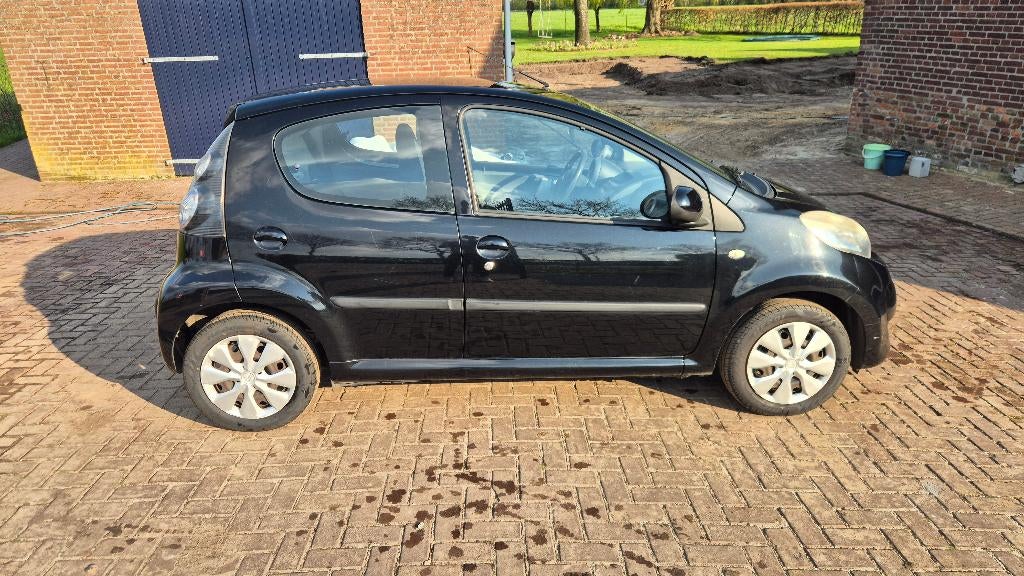Citroën C1 1.0 5-DRS 2010 Zwart, Auto's, Voorwielaandrijving, Stof, 4 stoelen, C1