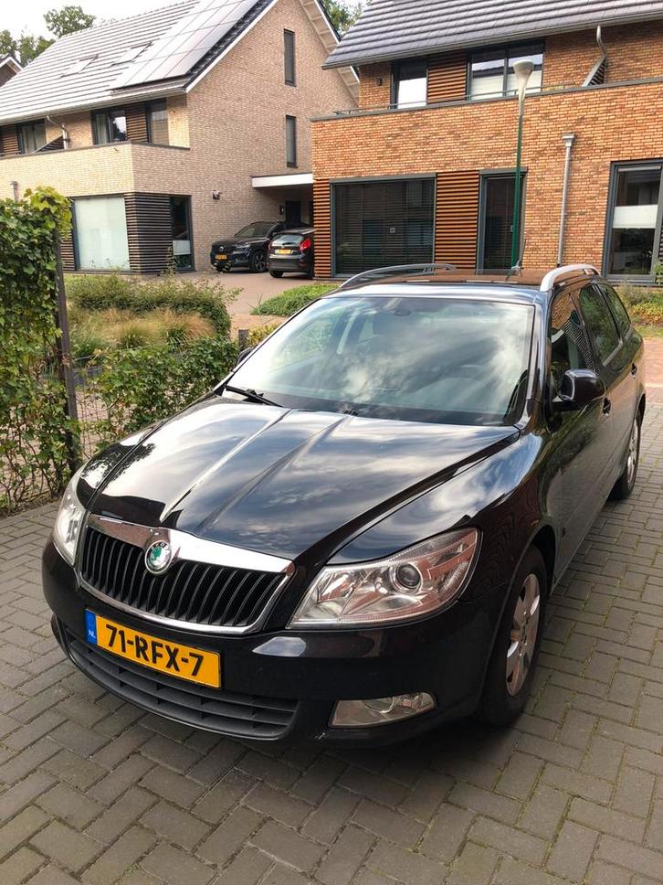 Skoda Octavia 1.2 TSI Combi DSG 2011 Zwart, Auto's, Skoda, Particulier, Octavia, ABS, Airbags, Airconditioning, Bluetooth, Boordcomputer