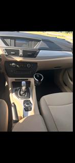 BMW X1 2.0 D Sdrive 18D AUT 2011 Bruin, Auto's, BMW, Achterwielaandrijving, Bruin, Origineel Nederlands, Diesel
