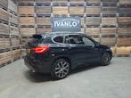 BMW X1 SDrive20i Centennial Executive Xenon Navi Airco Cruis, Auto's, BMW, 1998 cc, Stof, Zwart, Bedrijf