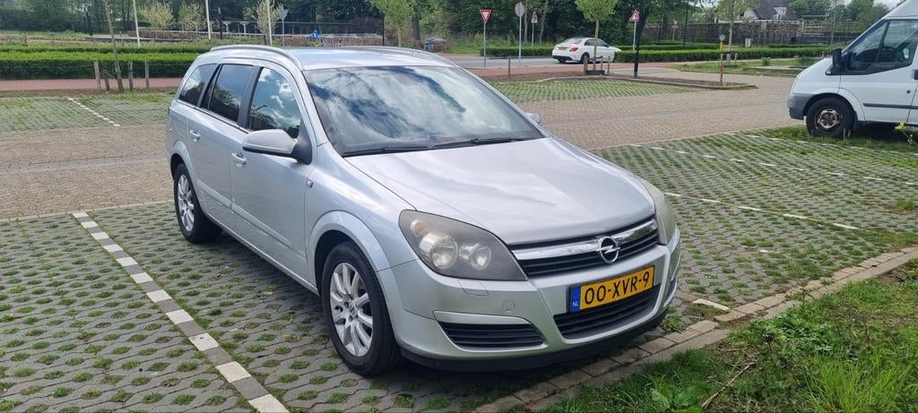 Opel Astra 1.8 16V St.wgn. Automatic 2005 Grijs, 125 pk, 1250 kg, Zwart, 4 cilinders