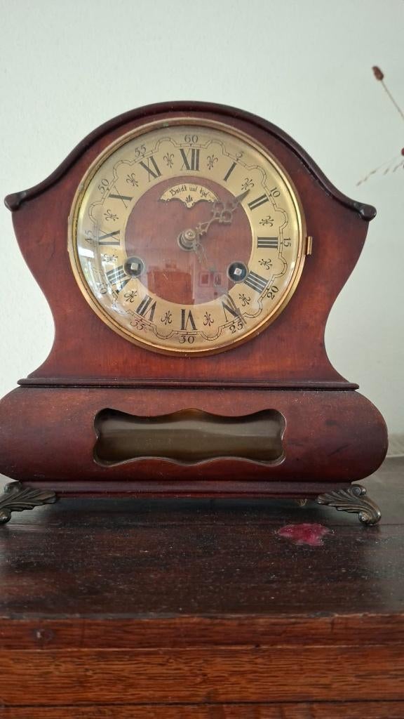 Wuba Warmink tafelklok, Ophalen