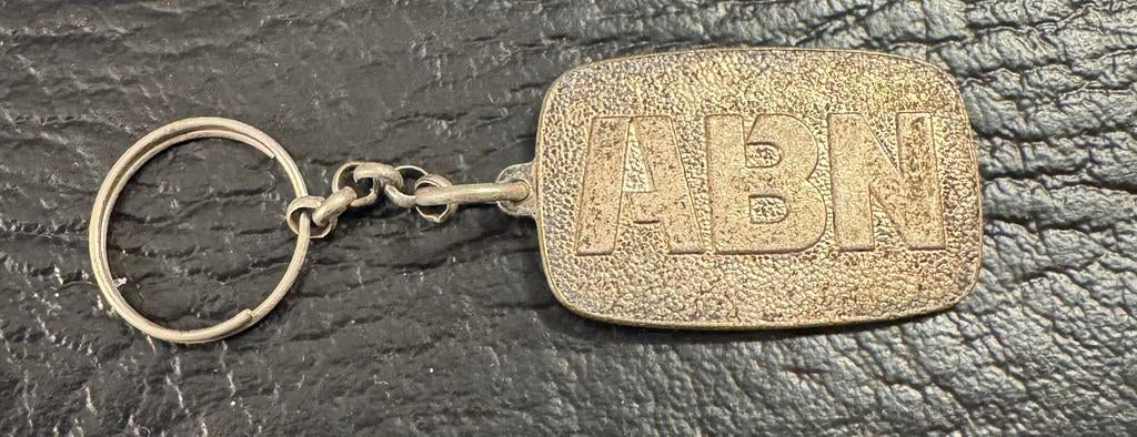 Sleutelhanger ABN bank verzilverd of vernikkeld, Verzamelen, Ophalen of Verzenden, Gebruikt, Merk