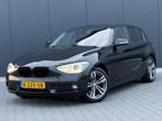 BMW 1-serie 125I Executive 218+PK - Xenon - Navi - Leder - C, Achterwielaandrijving, Gebruikt, 4 cilinders, Zwart