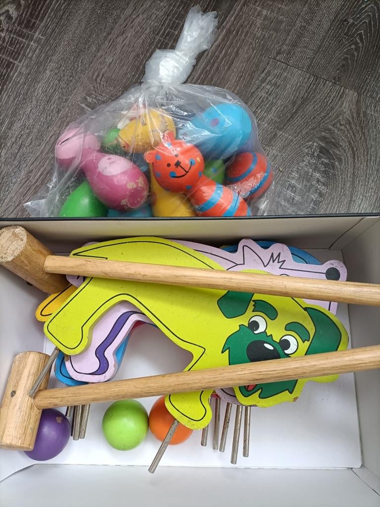Houten kindergolfset voor de tuin, Ophalen