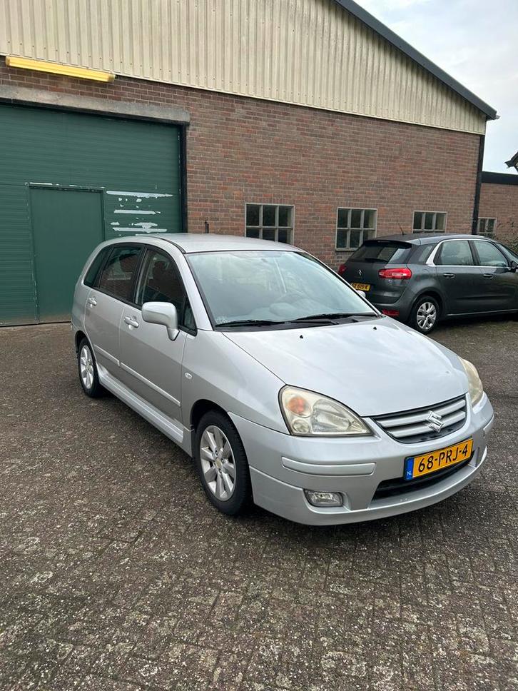 IN PRIJS VERLAAGD Suzuki Liana 1.6 2005 Grijs, Auto's, Suzuki, Bedrijf, ABS, Airbags, Bluetooth, Centrale vergrendeling, Cruise Control