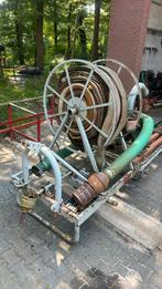 Waterpomp op aftakas met slangenhaspel en toebehoren, Ophalen
