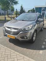 Hyundai iX35 1.6i GDI Blue 135pk 2012 Grijs, Auto's, Hyundai, Voorwielaandrijving, 1280 kg, 4 cilinders, Leder