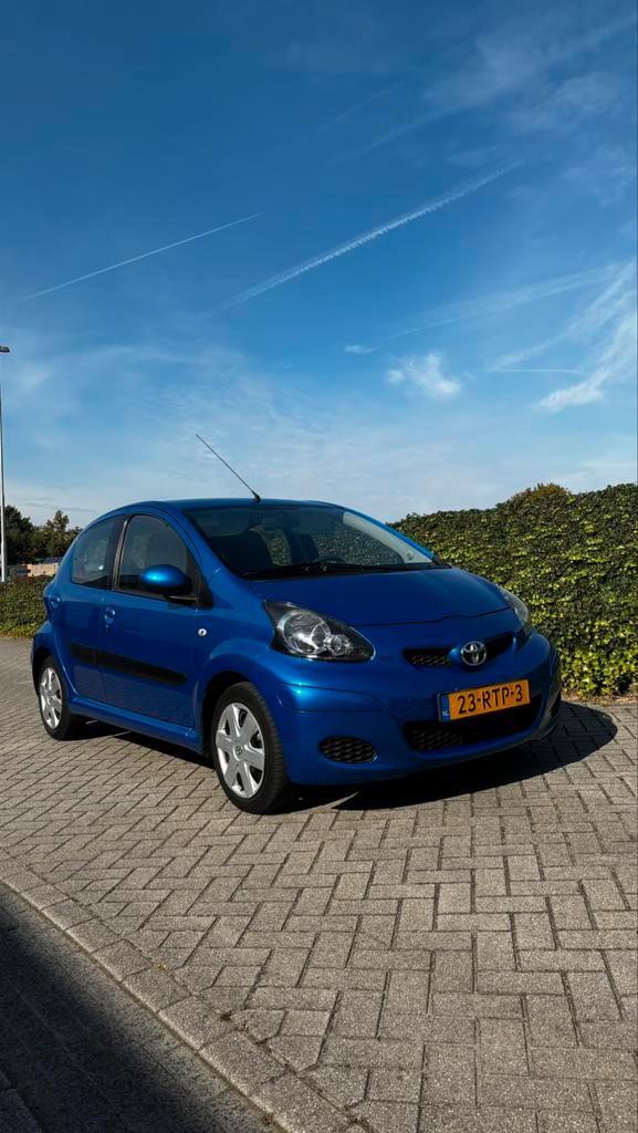 Toyota Aygo 1.0 12V Vvt-i 5DRS 2011 Blauw | APK - juni 2026, Auto's, Toyota, Aygo, ABS, Airbags, Airconditioning, Centrale vergrendeling