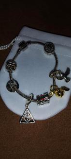 Bedel armband Harry Potter, Sieraden, Tassen en Uiterlijk, Armbanden, Overige materialen, Nieuw, Ophalen of Verzenden, Met bedels of kralen