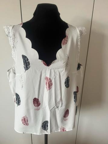 Leuke Top met verenprint beschikbaar voor biedingen