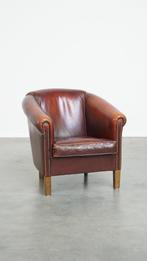 Schapenleren clubfauteuil met karakteristiek zitkussen, Huis en Inrichting, Fauteuils, Ophalen, Gebruikt, Vintage, Modern, Klassiek