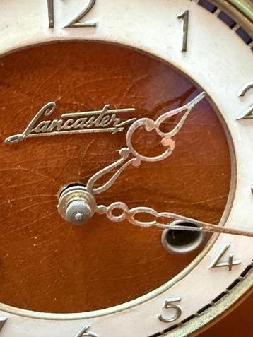 Vintage schoorsteenklok Lancaster en bazuin beschikbaar voor biedingen