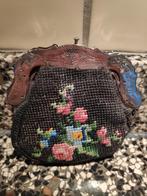 Zilveren beugel met geborduurde tasje, Ophalen