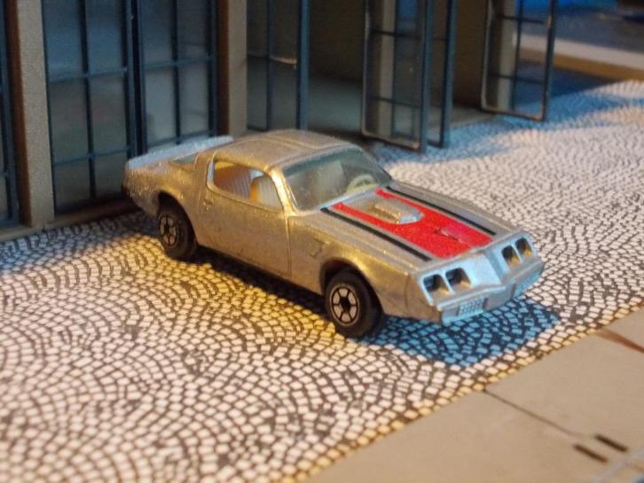 1979 Pontiac Firebird Trans-Am YatMing zilvergrijs Near Mint, Hobby en Vrije tijd, Modelauto's | Overige schalen, Gebruikt, Ophalen of Verzenden
