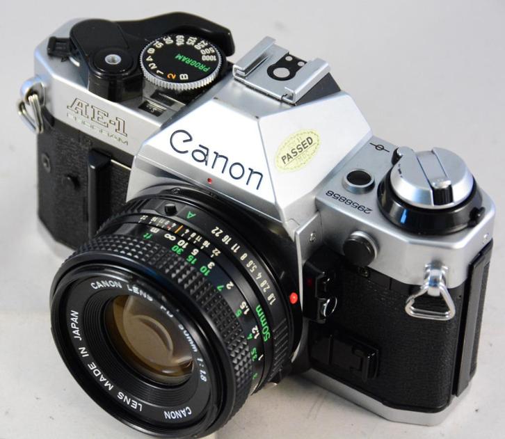 Canon AE-1 Program met 50mm/1.8 'new' VINTAGE in TOP STAAT, Audio, Tv en Foto, Fotocamera's Analoog, Refurbished, Spiegelreflex