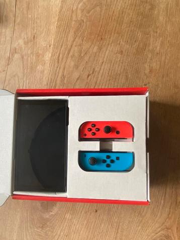 Switch OLED + accessoires beschikbaar voor biedingen