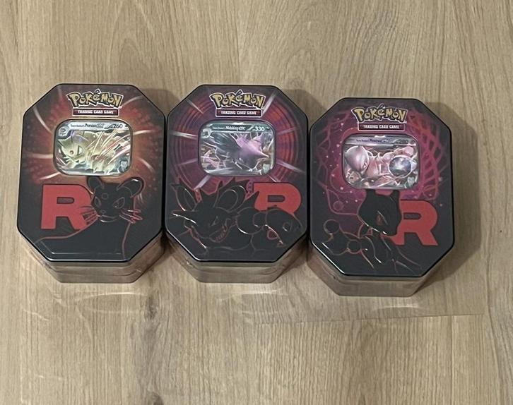 Team Rocket’s Tin, Hobby en Vrije tijd, Verzamelkaartspellen | Pokémon, Zo goed als nieuw, Boosterbox, Ophalen of Verzenden
