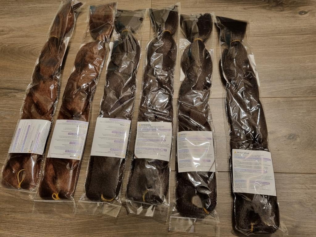 6 nieuwe pakken nephaar / vlechthaar bruin en lichtbruin, Ophalen of Verzenden, Nieuw