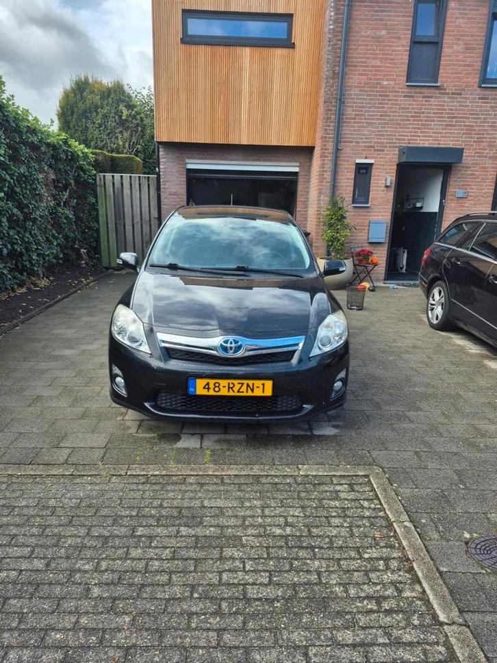 Toyota Auris 1.8 Full Hybrid 5DR CVT 2011 Zwart, Auto's, Toyota, Particulier, Auris, Hybride Elektrisch/Benzine, Volledig hybride