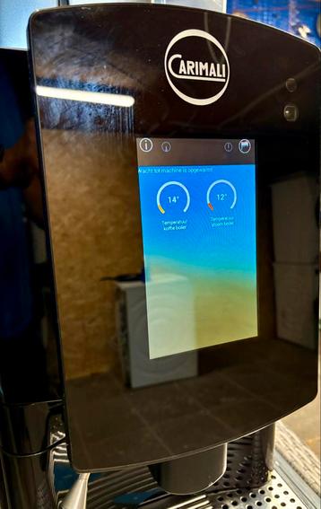 Koffiemachine Carimali met melkkoeler beschikbaar voor biedingen