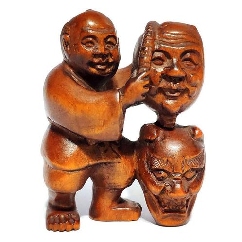 Houten Netsuke van een masker verkoper Japan, Antiek en Kunst, Kunst | Niet-Westerse kunst, Ophalen of Verzenden