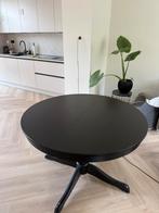 Uitschuifbare zwarte tafel, Huis en Inrichting, Tafels | Eettafels, Ophalen, Zo goed als nieuw, Rond, 100 tot 150 cm