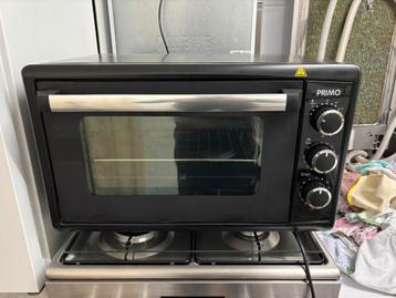 Primo Grill en Bakoven - Gebruikt maar werkt nog goed beschikbaar voor biedingen