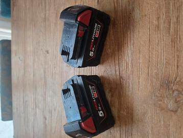 2x bat 18 volt 5 amp zo goed als nieuw milwaukee  beschikbaar voor biedingen