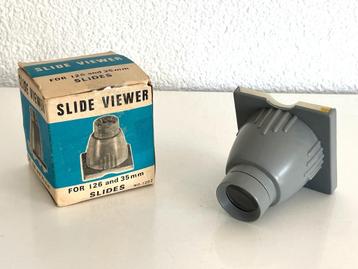 Een vintage slide viewer, 126 en 35 mm, met doosje beschikbaar voor biedingen