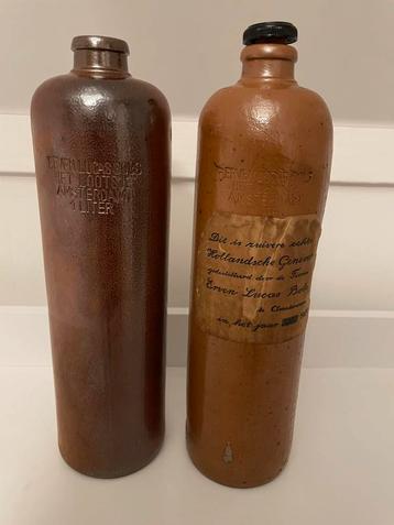 Erven Lucas Bols | twee steengoed jeneverflessen | 1900-1950 beschikbaar voor biedingen