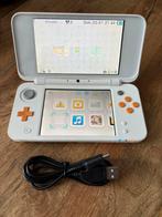 New Nintendo 2DS XL Wit + Lader, Spelcomputers en Games, Spelcomputers | Nintendo 2DS en 3DS, Ophalen of Verzenden, Zo goed als nieuw