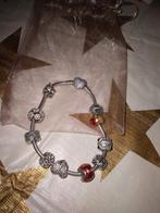 Pandora armband met bedels, Ophalen