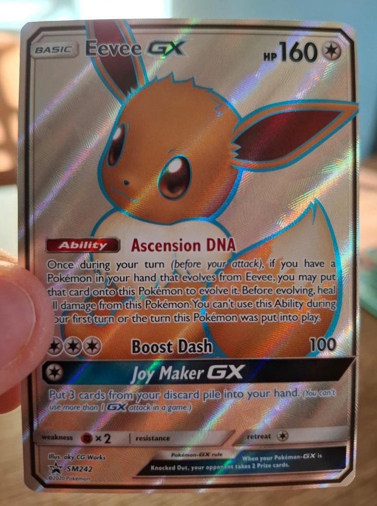Eevee SM242 GX Promo, Ophalen of Verzenden, Zo goed als nieuw, Losse kaart, Foil