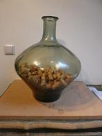 grote drankfles, Ophalen