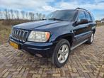 Jeep Grand Cherokee 4.7 I V8 Overland AUT 2004 Blauw, Auto's, Jeep, Automaat, USB, 8 cilinders, 258 pk