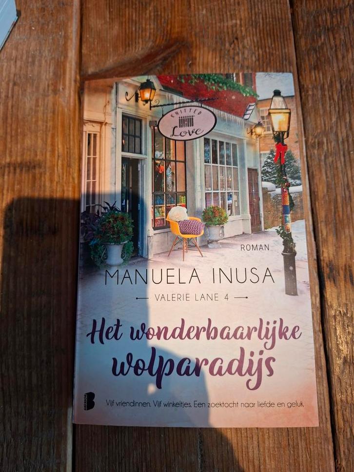 Manuela Inusa - Het wonderbaarlijke wolparadijs, Boeken, Literatuur, Zo goed als nieuw, Ophalen of Verzenden
