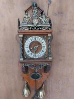 Antieke JWA klok, Ophalen