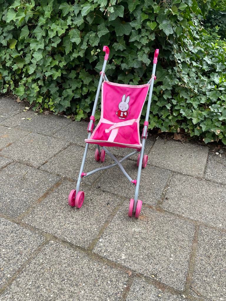 Nijntje poppen buggy - Roze kinderwagen voor poppen, Kinderen en Baby's, Speelgoed | Poppen, Ophalen, Gebruikt, Overige typen