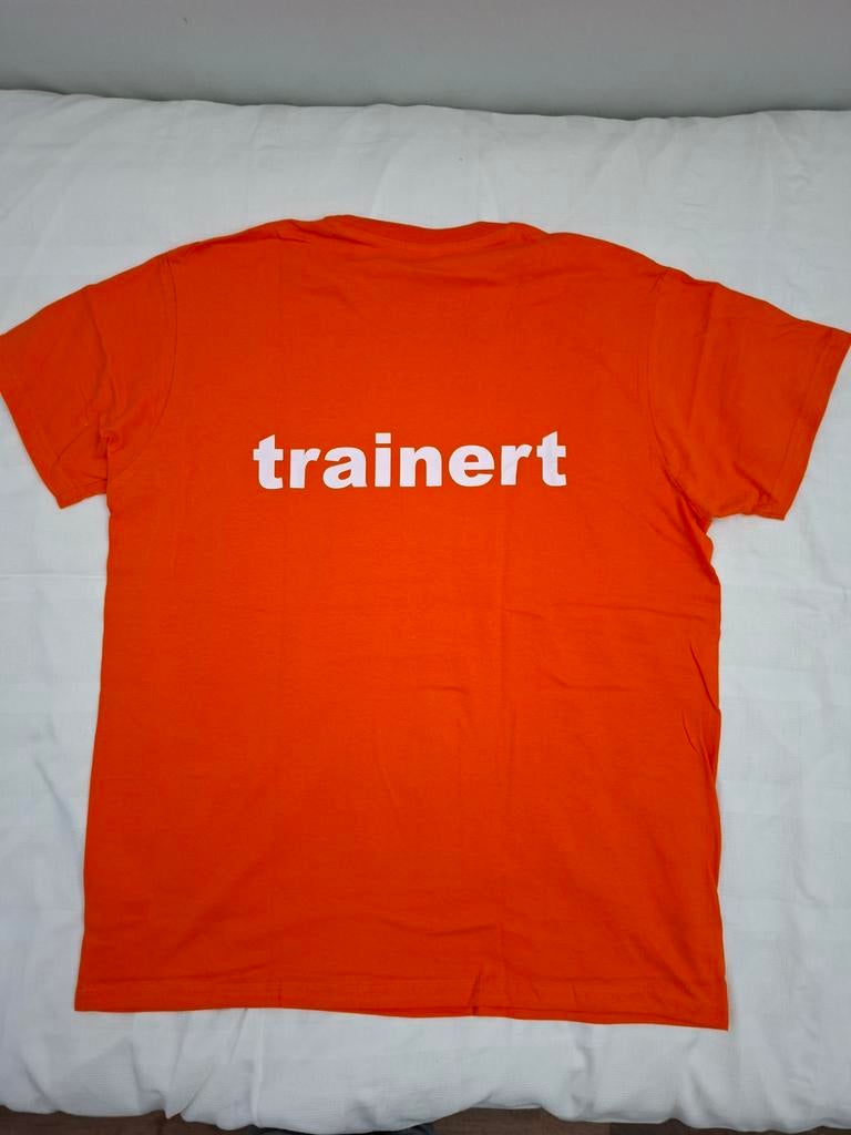 Nieuw oranje T-shirt met 'trainert' opdruk, Ophalen of Verzenden, Nieuw, Oranje