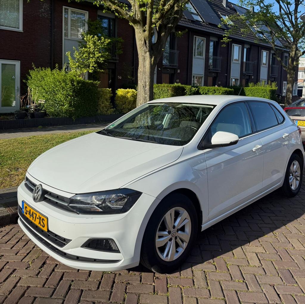 Volkswagen Polo 1.0 TSI 95pk 2019 Wit - 72.500 km, Auto's, Voorwielaandrijving, Stof, 40 €/maand, 95 pk