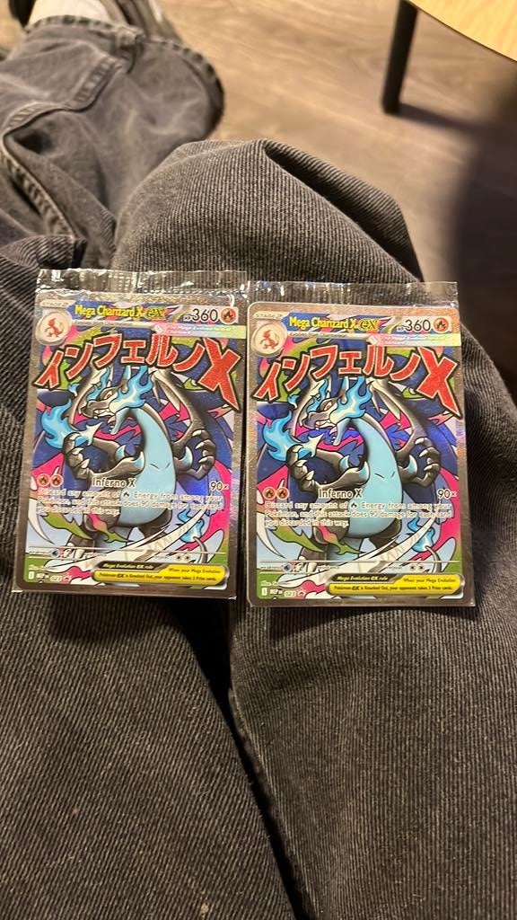Mega charizard ex promo 023 in seal, Ophalen of Verzenden, Zo goed als nieuw