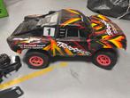 TRAXXAS Slash 4x4 RC auto met laders en batterijen, Hobby en Vrije tijd, Modelbouw | Radiografisch | Auto's, Elektro, Gebruikt