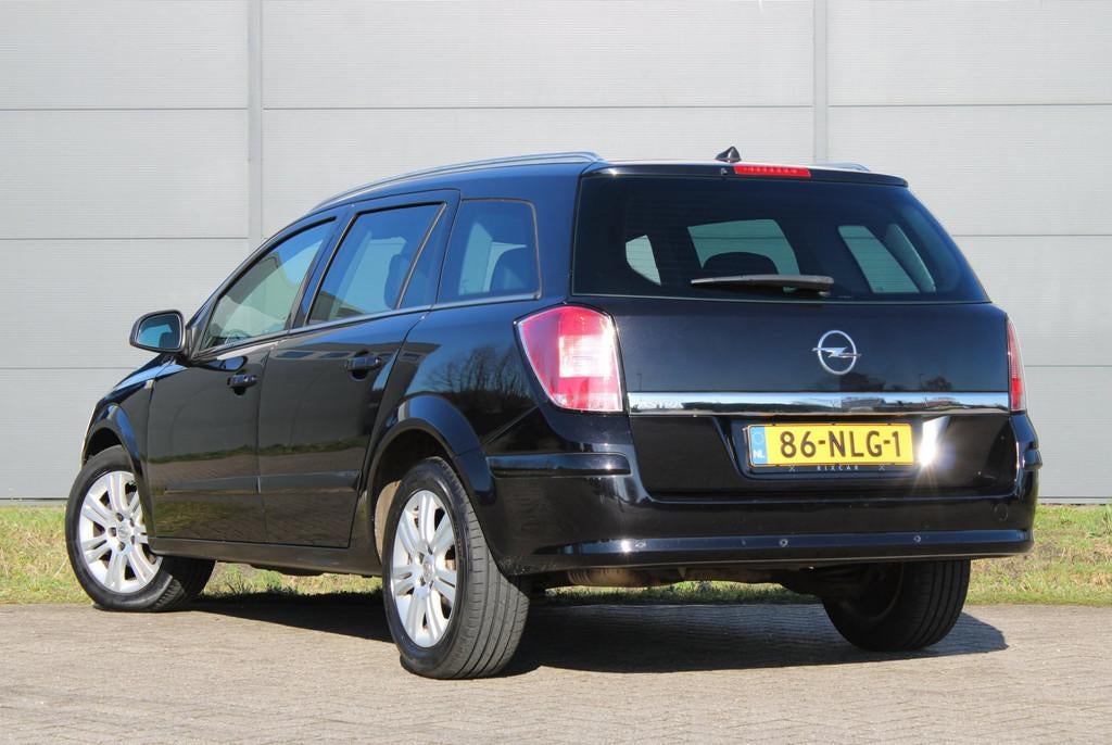 Opel Astra Wagon 1.6 Cosmo Leder Parkeersensoren Climate !NI, Voorwielaandrijving, 15 km/l, Gebruikt, Zwart