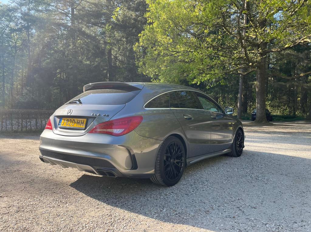 Mercedes-Benz CLA 45 AMG Shooting Brake 4MATIC Automaat, Auto's, Mercedes-Benz, Automaat, CLA, Zwart, 4 cilinders