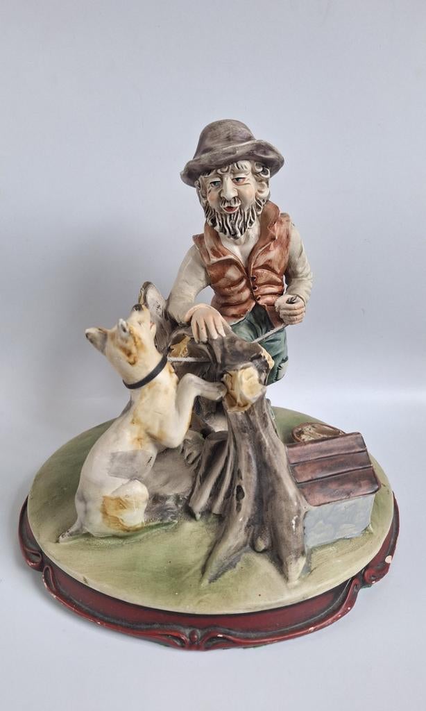 Vintage porseleinen beeld van man met hond., Ophalen of Verzenden, Zo goed als nieuw