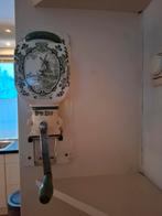 Hand koffie molen, Ophalen